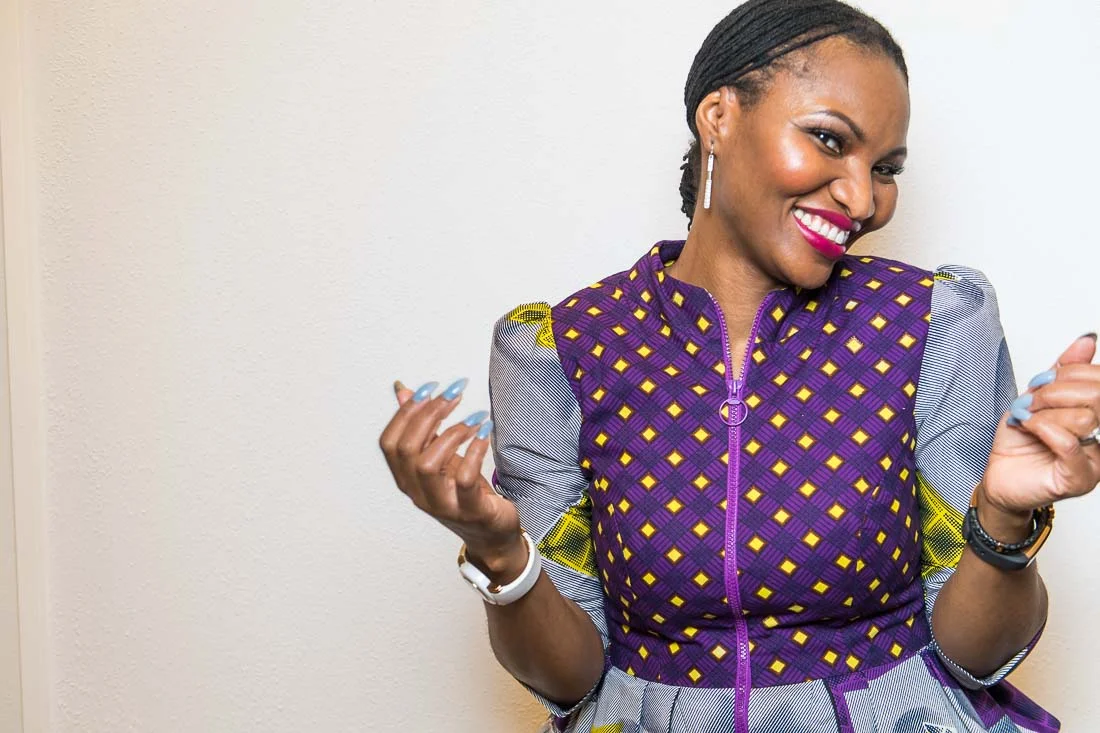 NYC Branded Lifestyle Portraits Lawyer Speaker Chinwe Esimai dancing in Nigerian outfit