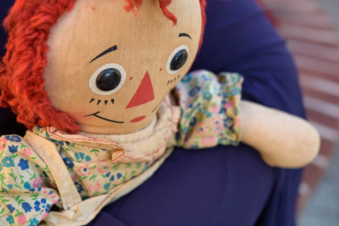 NYC Branded Lifestyle Portraits Social Pivot PR Donna Cravotta holding raggity ann doll