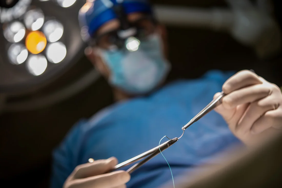 NYC Branded Lifestyle Portraits Doctor Author Dr. Brian Lima preforming surgery