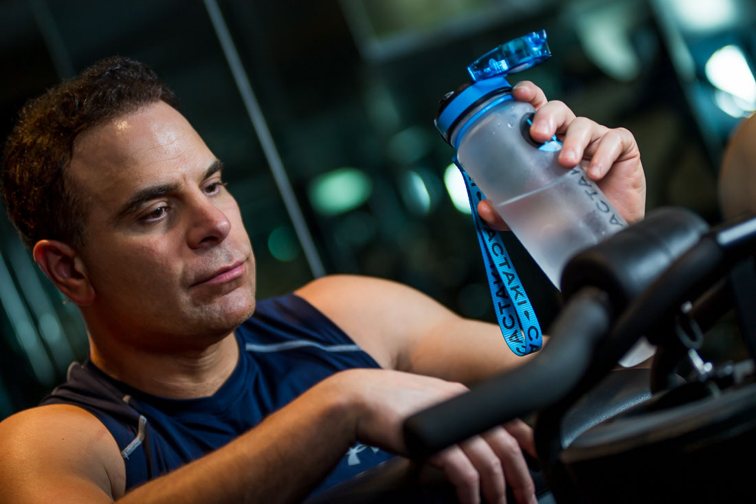 NYC Branded Lifestyle Portraits Doctor Author Dr. Brian Lima taking a break from working out