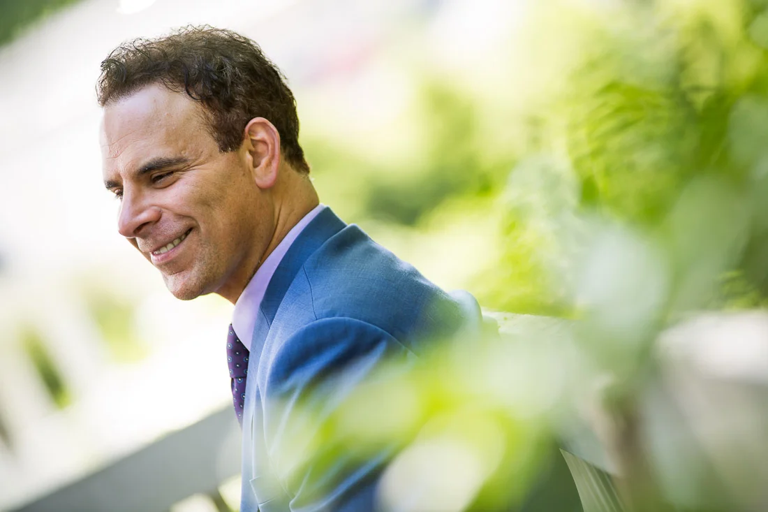 NYC Branded Lifestyle Portraits Doctor Author Dr. Brian Lima smiling to himself