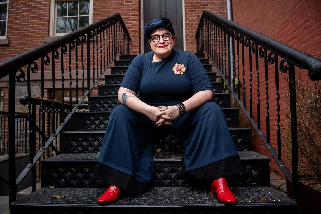 NYC Branded Lifestyle Portraits Speaker Jess Pettitt sitting on stoop
