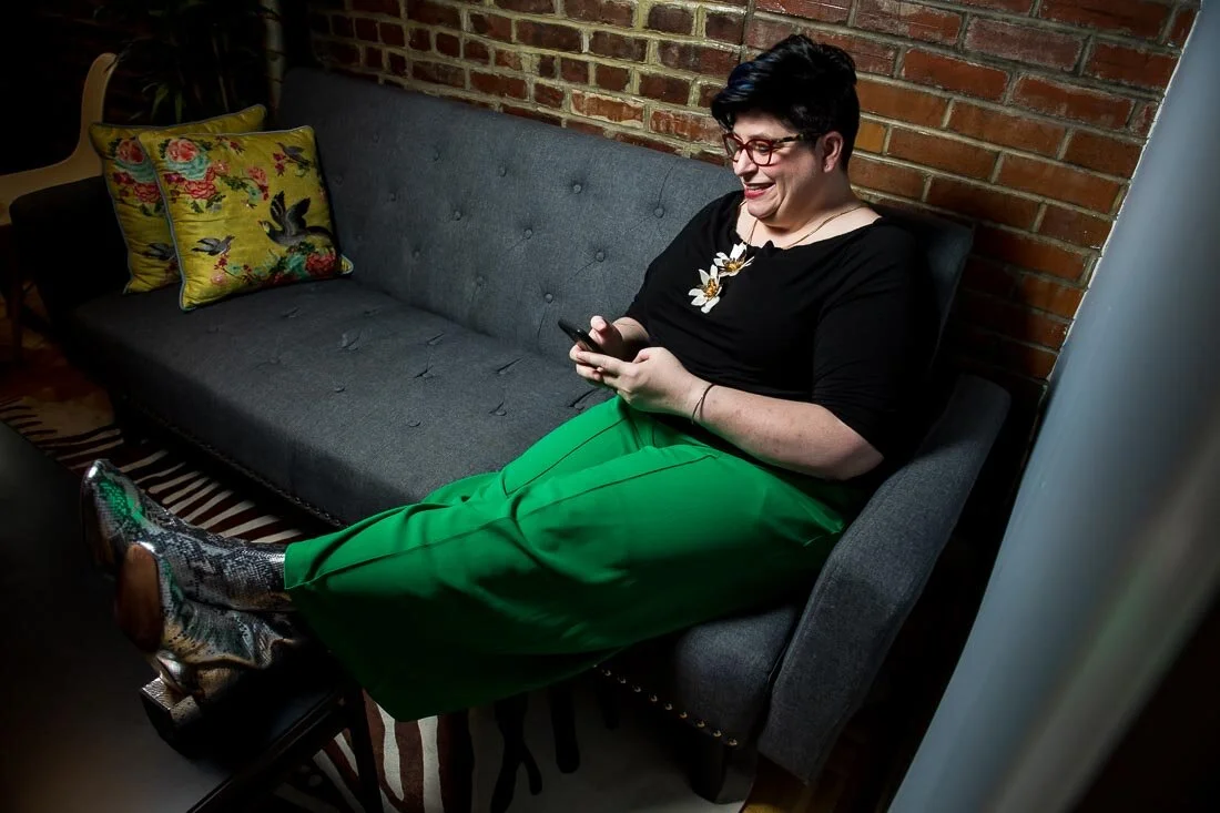 NYC Branded Lifestyle Portraits speaker Jess Pettitt working on her phone