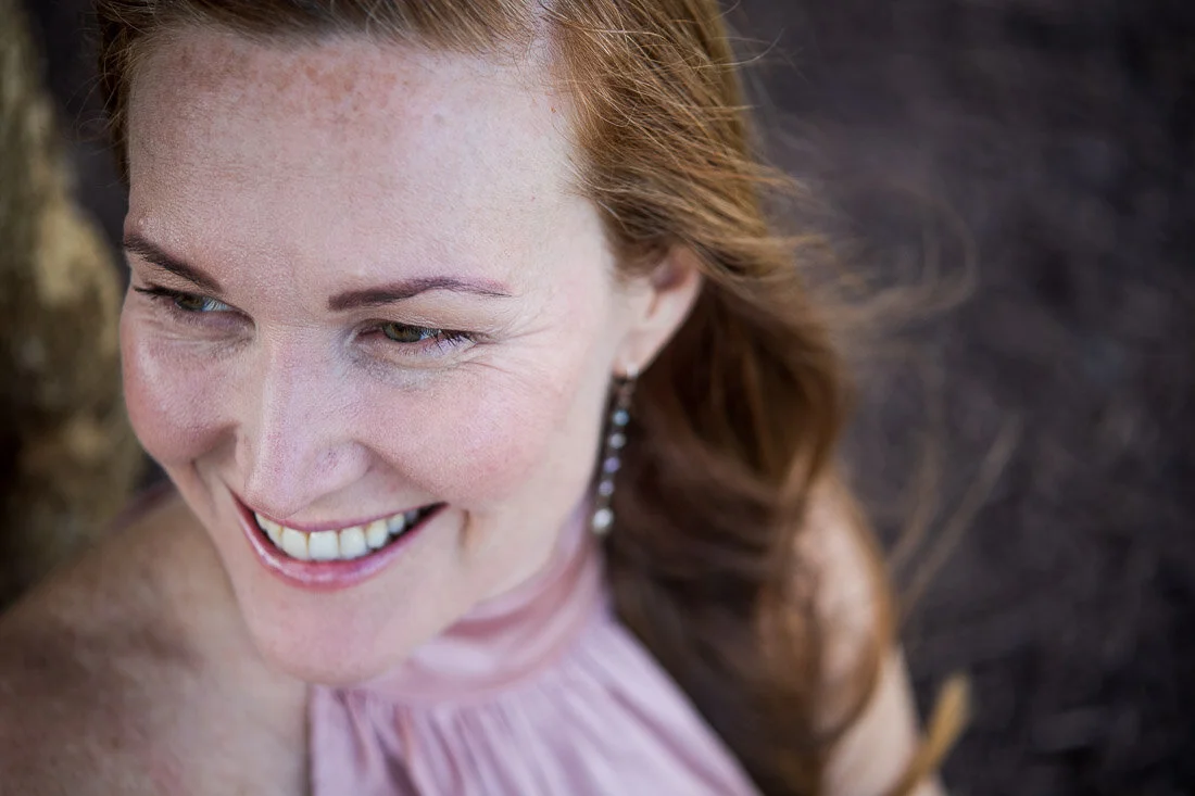 NYC branded lifestyle portrait Speaker Mary Rooney looking off camera smiling