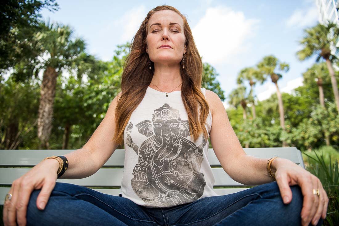 NYC branded lifestyle portrait Speaker Mary Rooney meditating
