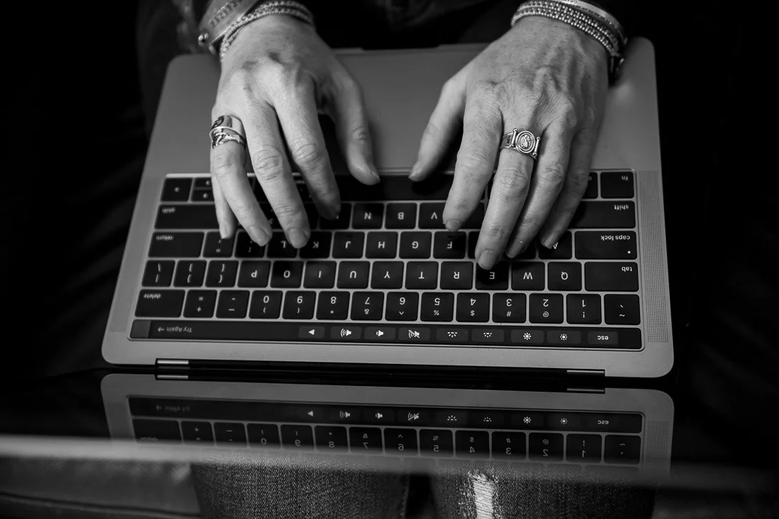 NYC branded lifestyle portrait Speaker Mary Rooney hands typing on computer