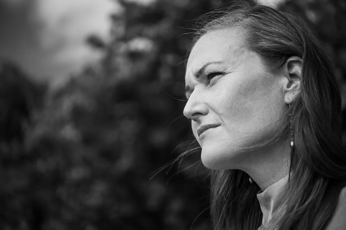 NYC branded lifestyle portrait Speaker Mary Rooney thinking to herself