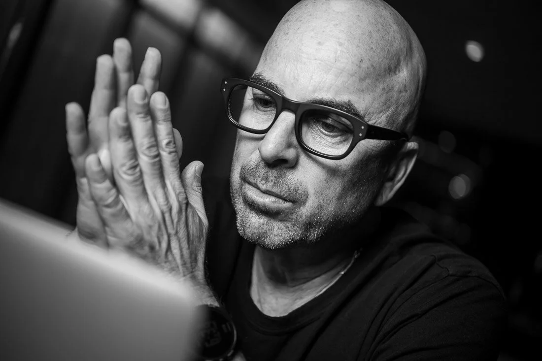 NYC Branded Lifestyle Portrait Howie Doin It Howie Kra reading an article on his laptop