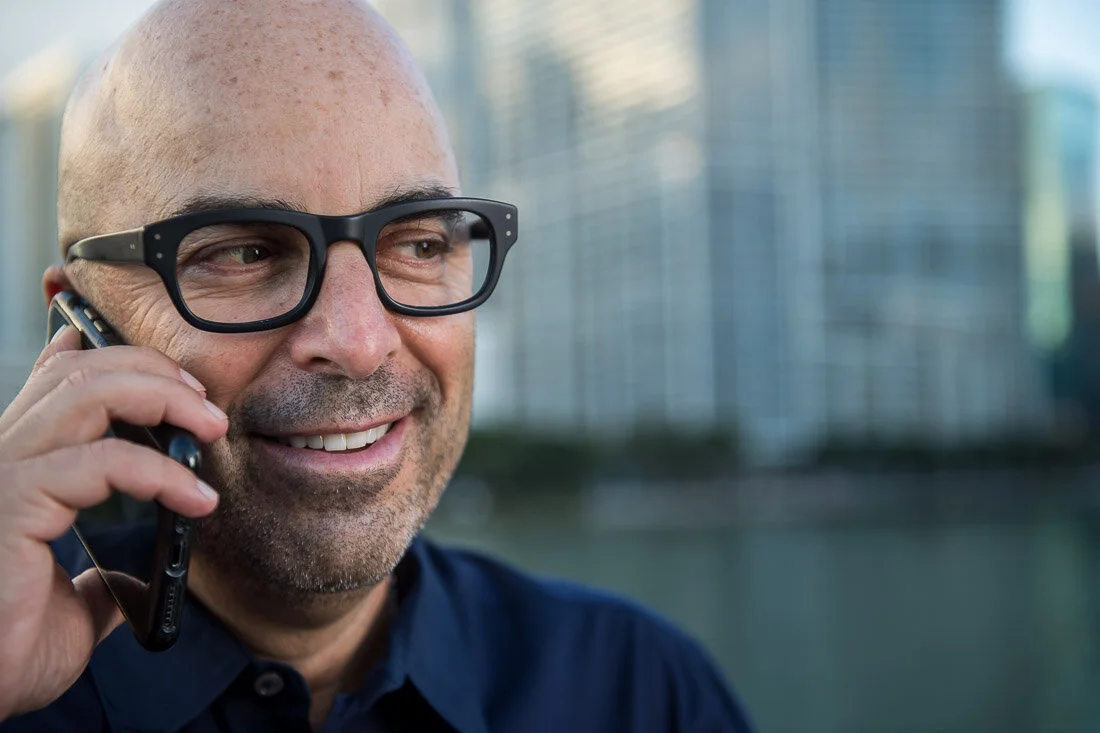 NYC Branded Lifestyle Portrait Howie Doin It Howie Kra having a phone conversation