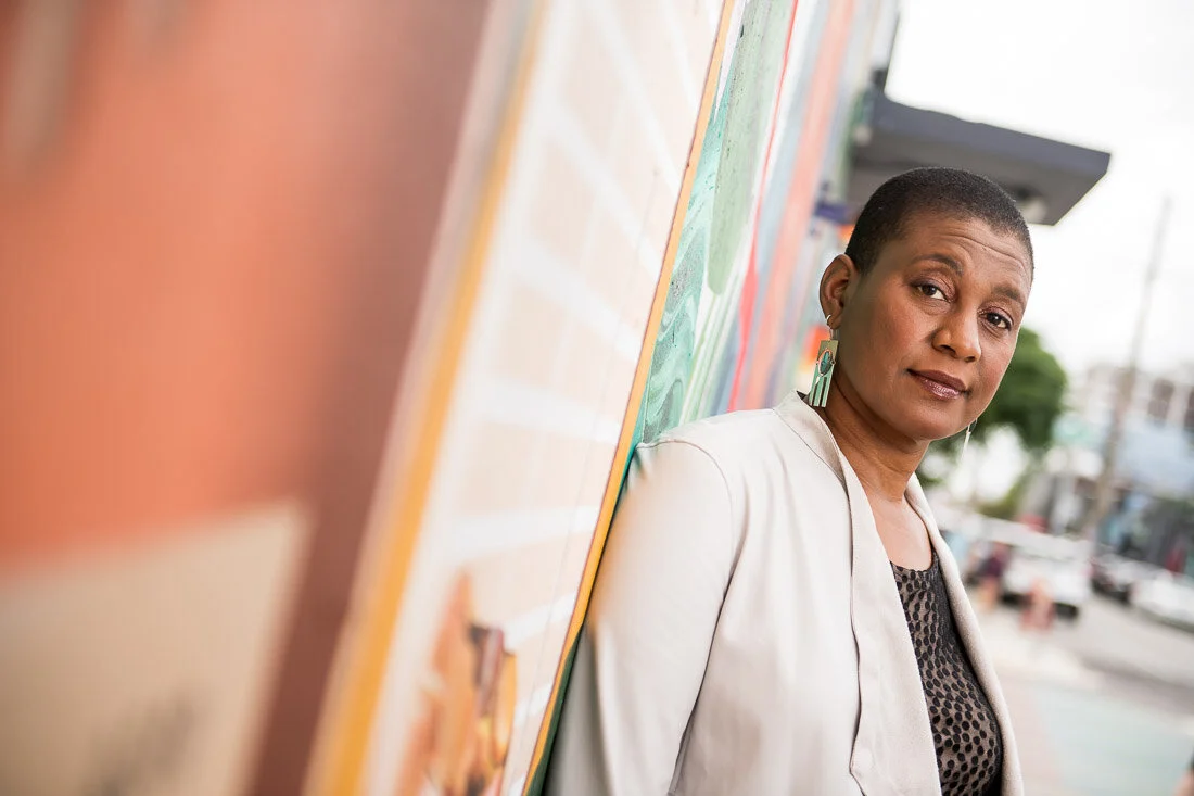 NYC branded lifestyle portrait Speaker Author Denise Jacobs giving sassy expression to camera
