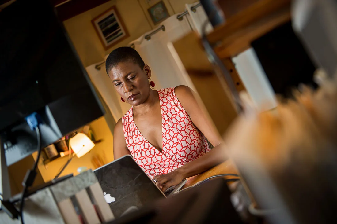 NYC branded lifestyle portrait Speaker Author Denise Jacobs working in her office