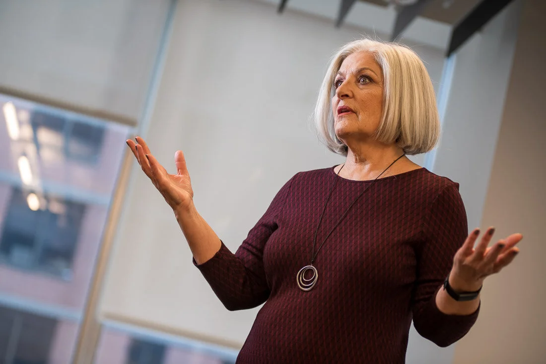 NYC Personal Branding Photography Speaker Trainer Janet Neal speaking profoundly to audience