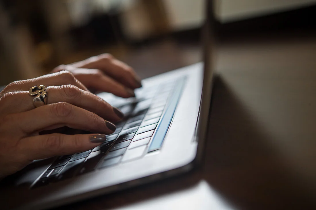 NYC Personal Branding Photography Speaker Trainer Janet Neal hands closeup typing on laptop