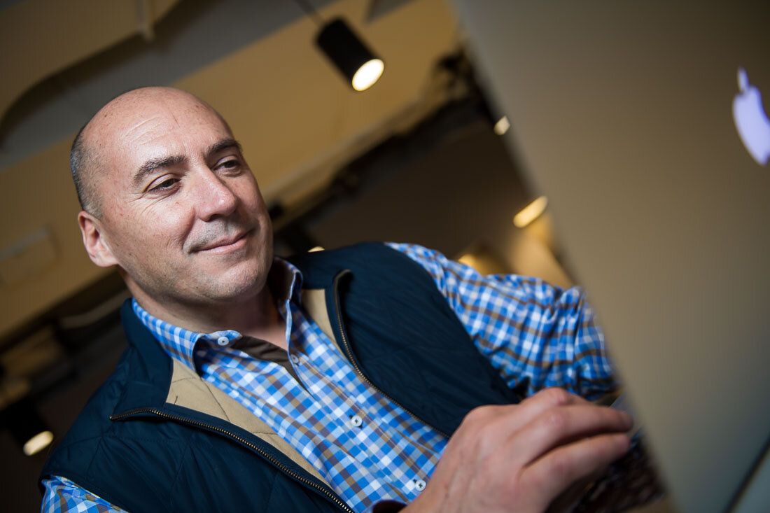 NYC personal branding photography CEO Ray Kober on the computer typing