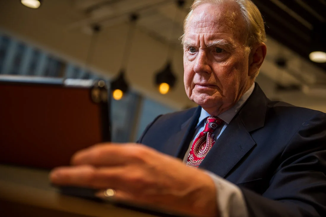 NYC personal branding photography speaker political consultant Jay Townsend working on his tablet