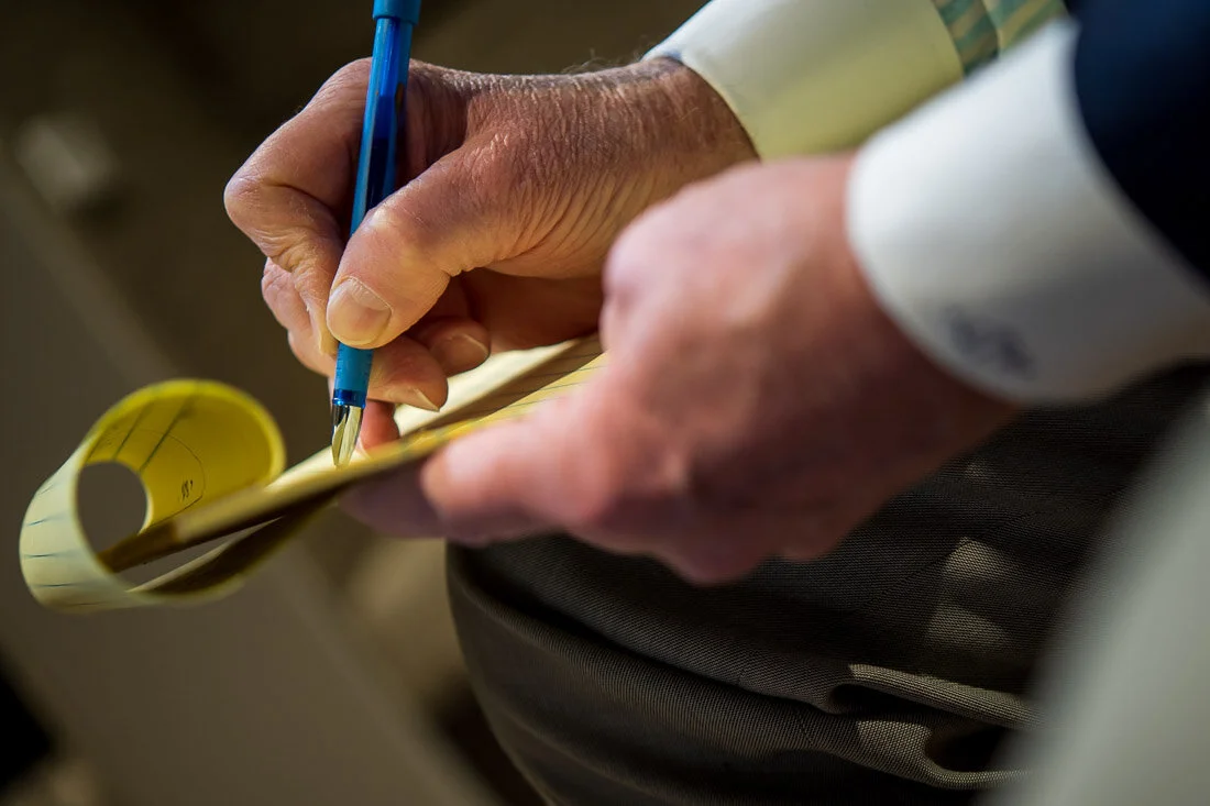 NYC personal branding photography speaker political consultant Jay Townsend closeup hands while writing in pad