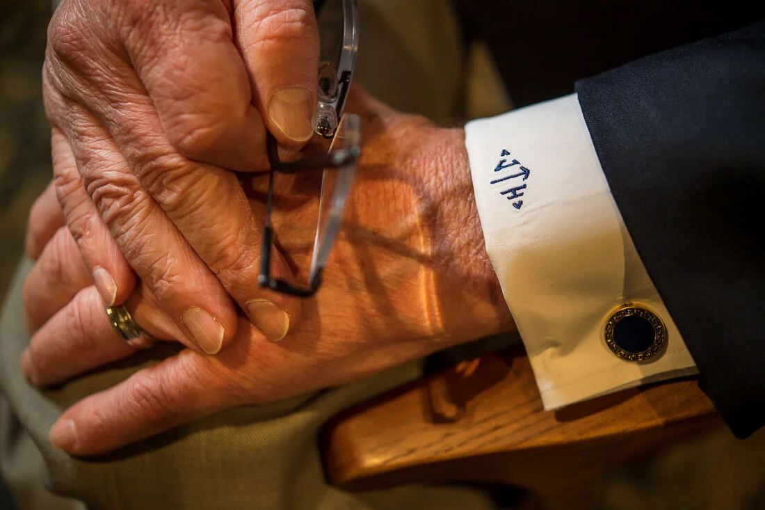 NYC personal branding photography speaker political consultant Jay Townsend resting hands with monogram visible