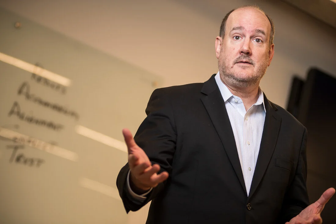 NYC personal branding photography Speaker Consultant Ken Blackwell  addressing a crowd during keynotye