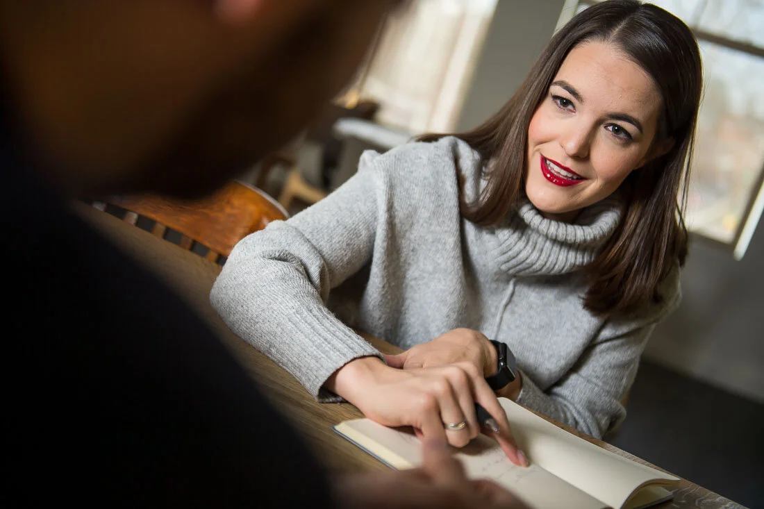 NYC personal branding photo Speaker Author Melanie Deziel consulting with a client