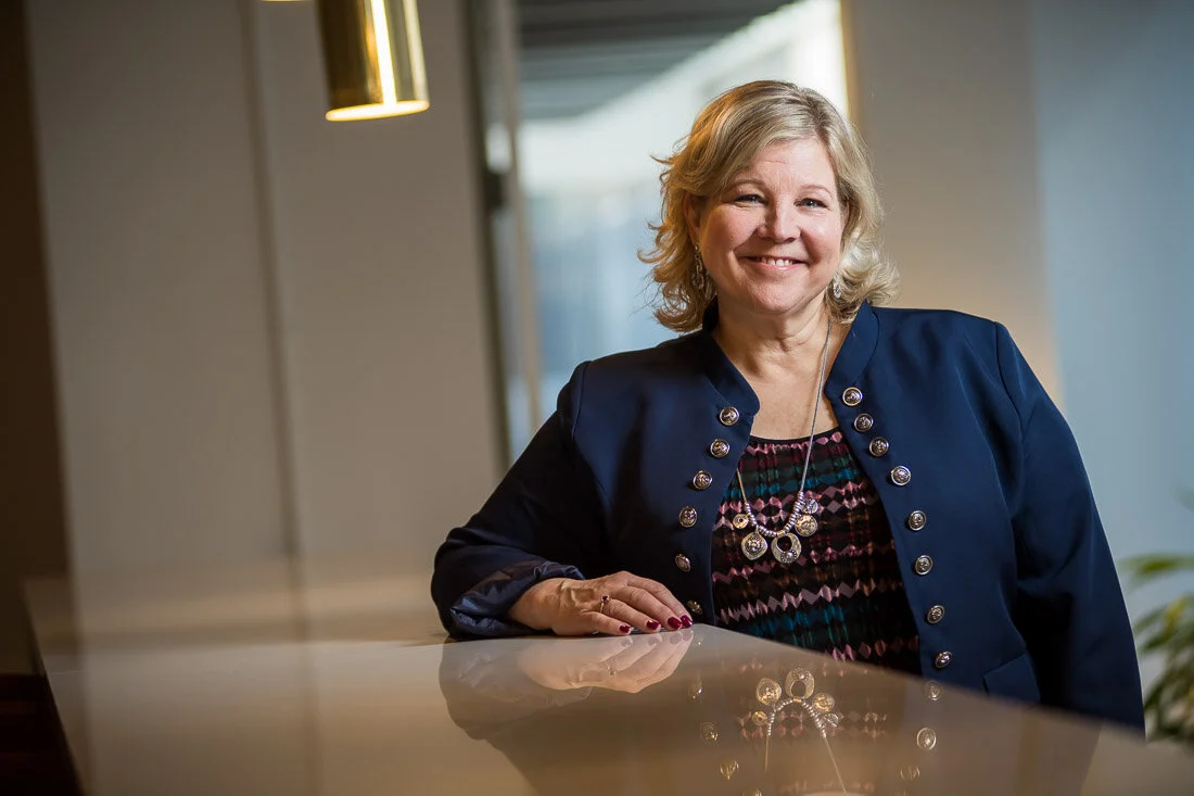 NYC Branded Lifestyle Portrait Speaker Lisa Haen smiling in front of camera