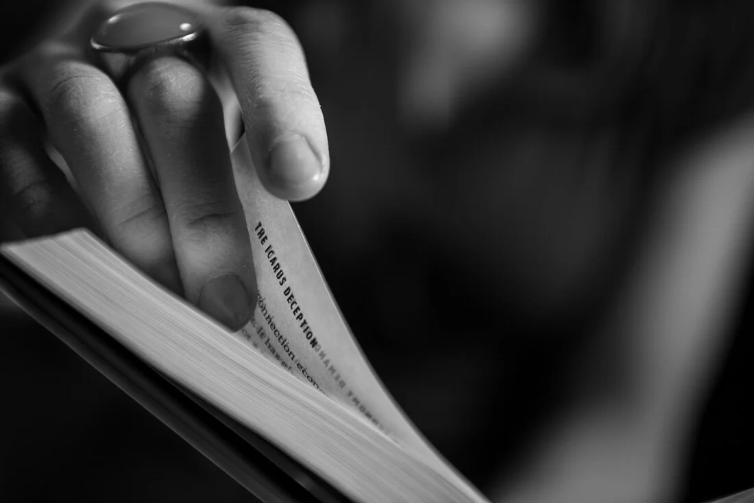 NYC branded lifestyle portraits speaker writer Terri Trespicio hand turning page of a book