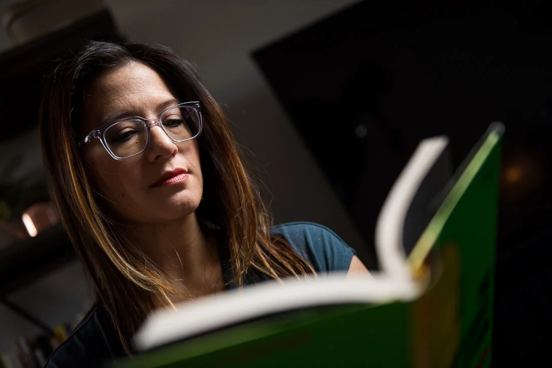 NYC branded lifestyle portraits speaker writer Terri Trespicio reading a book