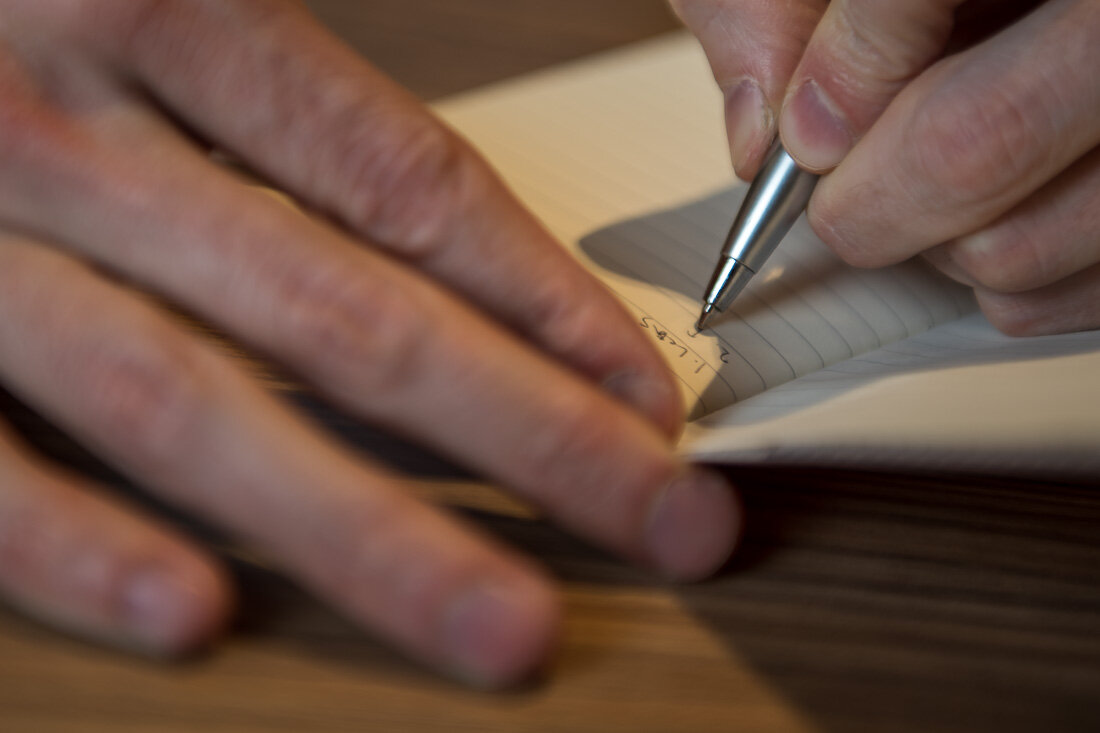 NYC Personal Branding Photography Humorist Drew Tarvin close up handwriting in notebook