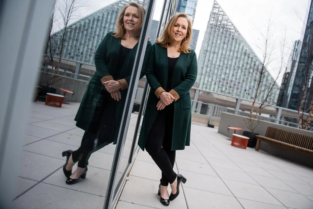 NYC personal branding photography Speaker Facilitator Jeanne Stafford smiling looking to camera