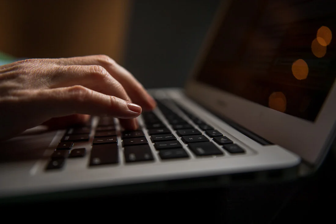 NYC personal branding photography Speaker Facilitator Jeanne Stafford close up hands typing on phone
