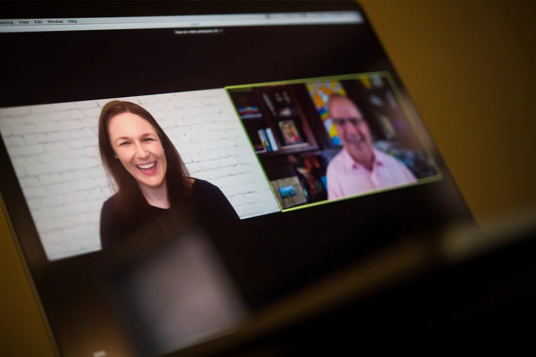 DeMato Virtual Photography Speaker Emcee Jill Schiefelbein laughing while conducting a fireside chat