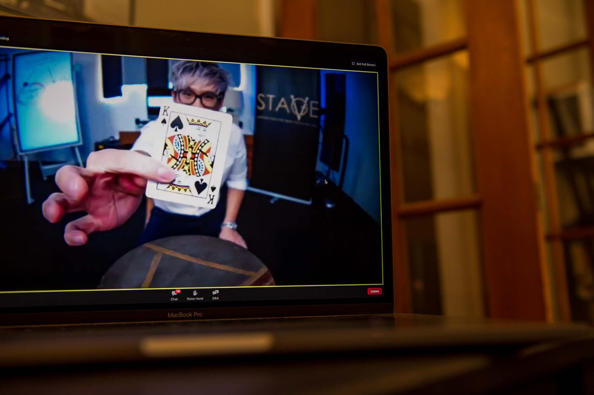 DeMato Virtual Photos Speaker Vinh Giang holding up King Of Spades playing card