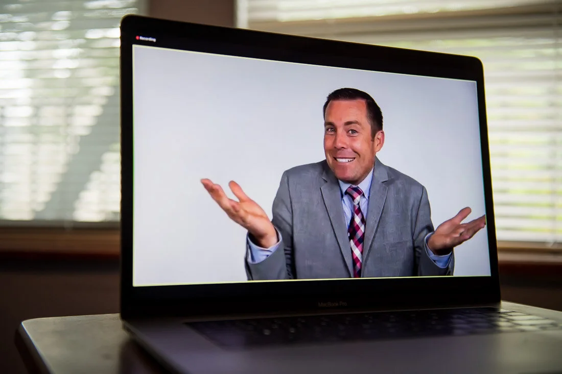 DeMato Virtual Photos Speaker Ty Bennett throwing hands up in silly way