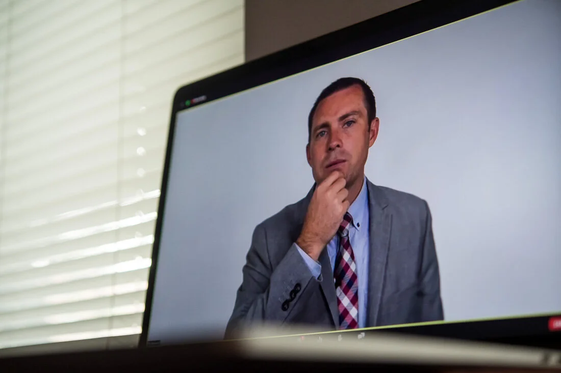 DeMato Virtual Photos Speaker Ty Bennett pausing and thinking during online presentation