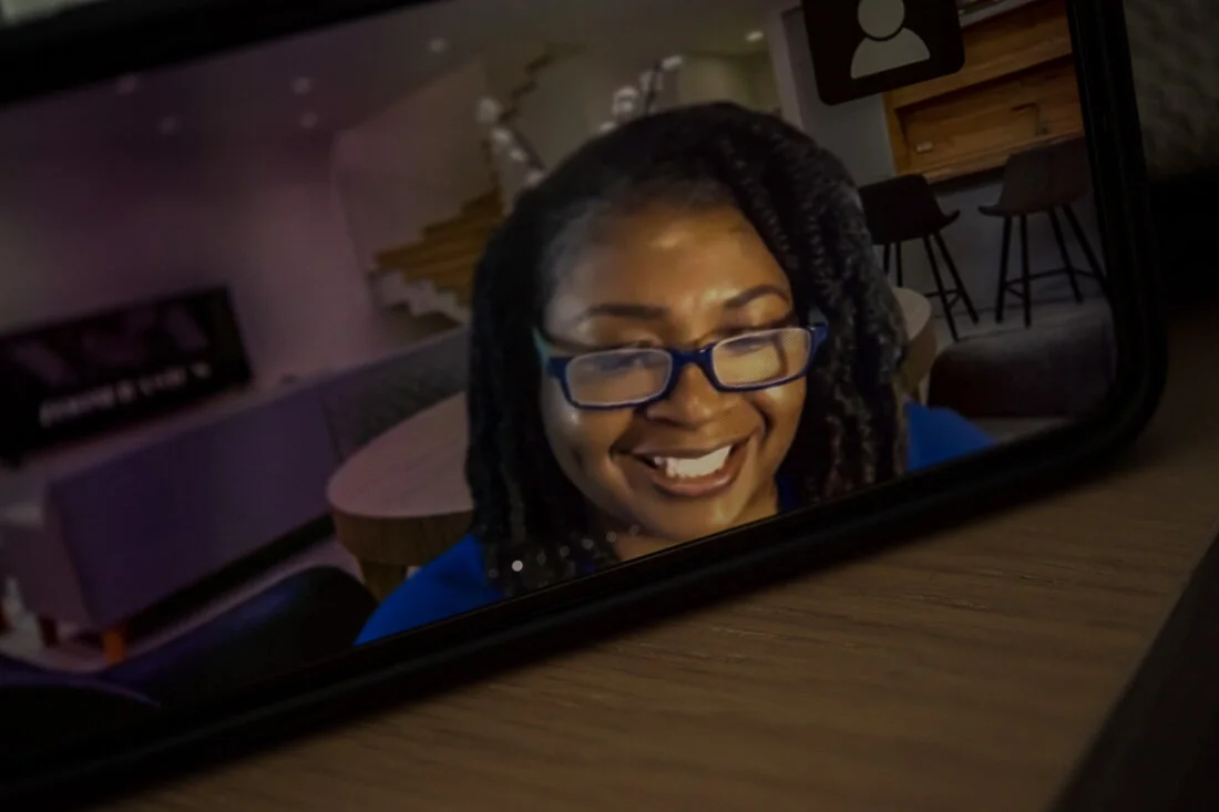 Virtual Photo Speaker Marquesa Pettway smiling speaker mode on phone