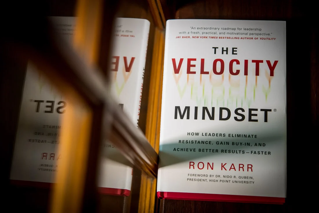 Book Author Ron Karr Velocity Mindset cover of book on table