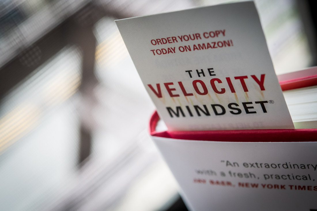 Book Author Ron Karr Velocity Mindset closeup of bookmark hanging out in book