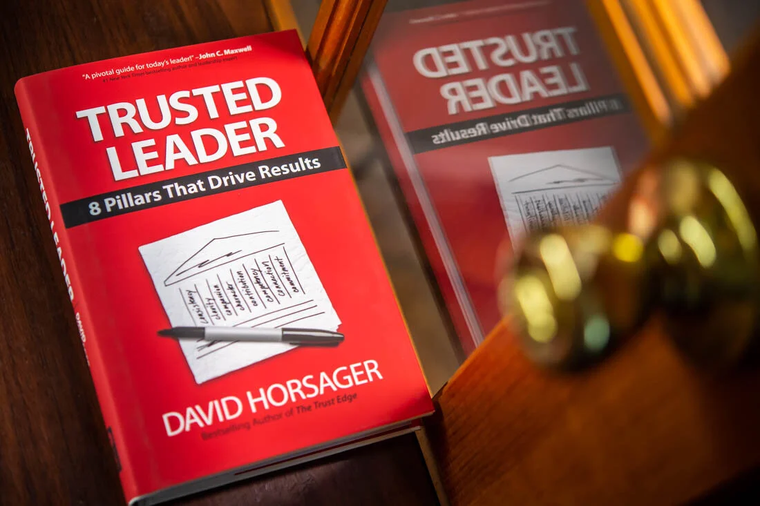 Book Author Photo Speaker David Horsager Trusted Leader cover photo sitting on table