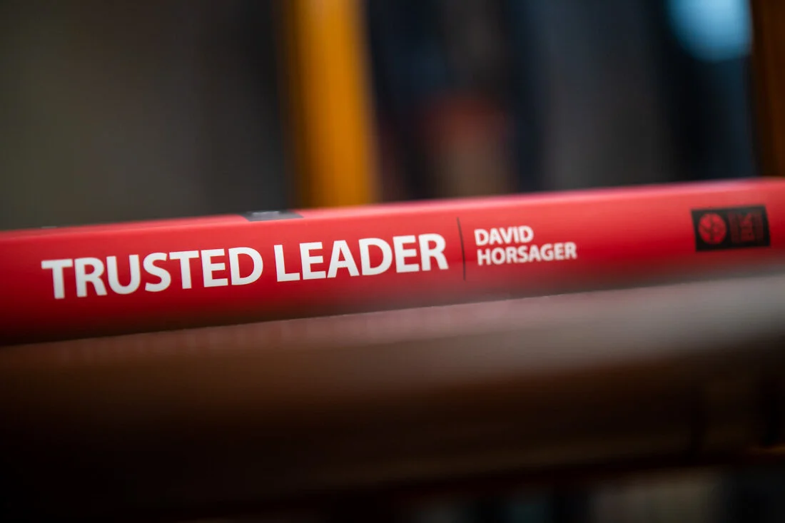 Book Author Photo Speaker David Horsager Trusted Leader spin photo book laying on table