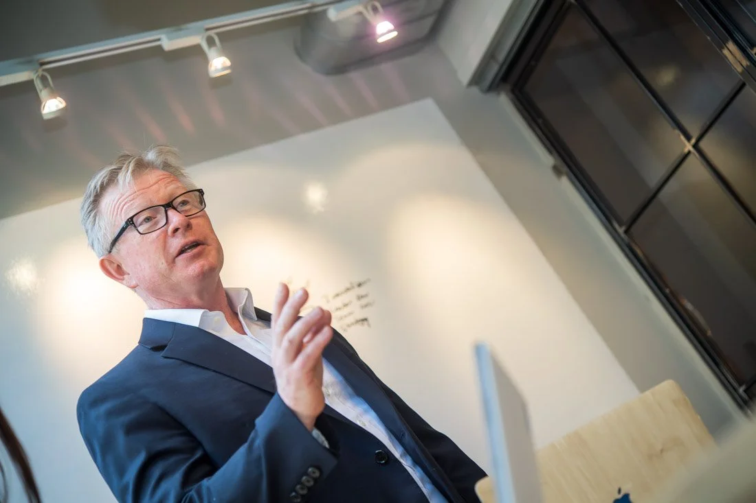 Cascade Leadership Partners brand photo Mark presenting in board room