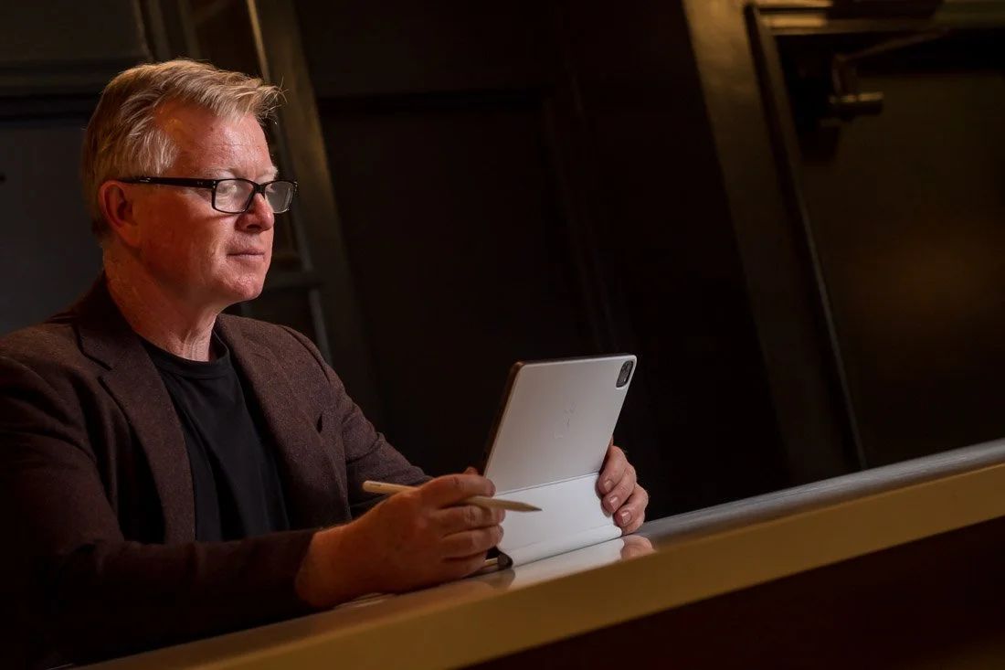 Cascade Leadership Partners brand photo Mark working on IPad