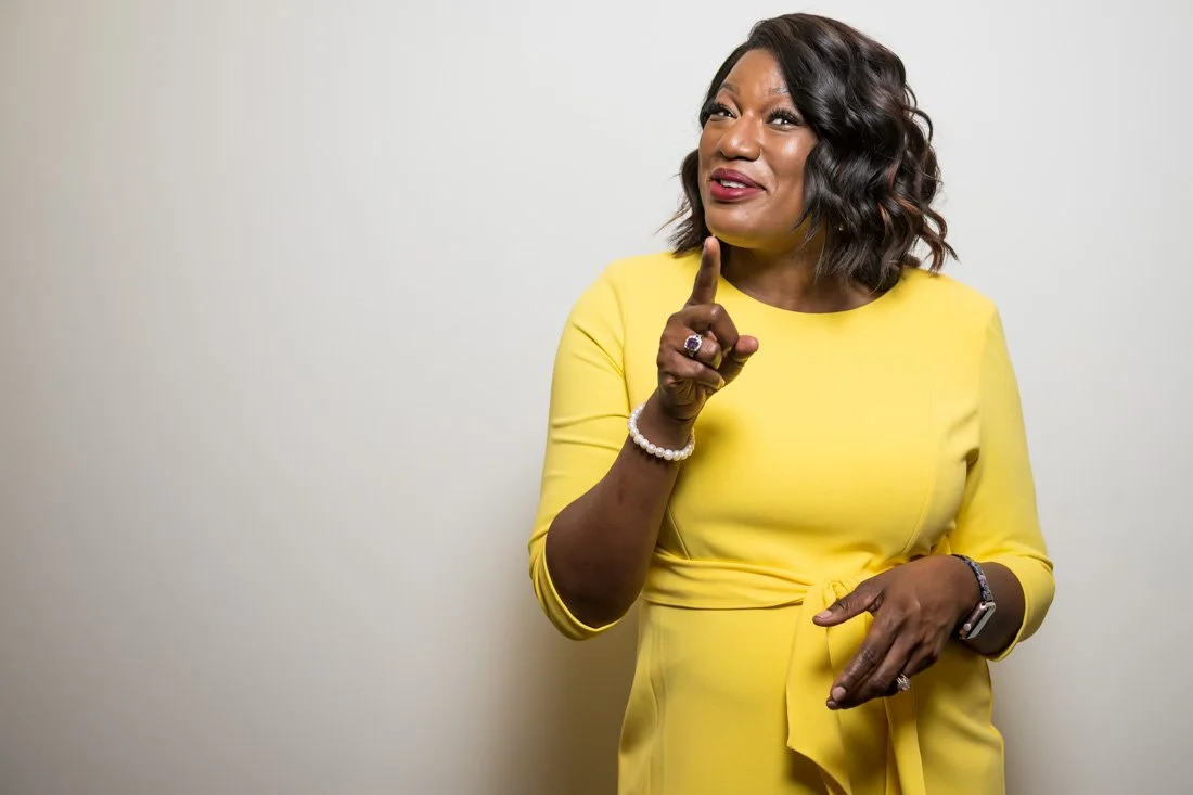 personal branding photo speaker author Jasmine Brett Stringer speaking to camera