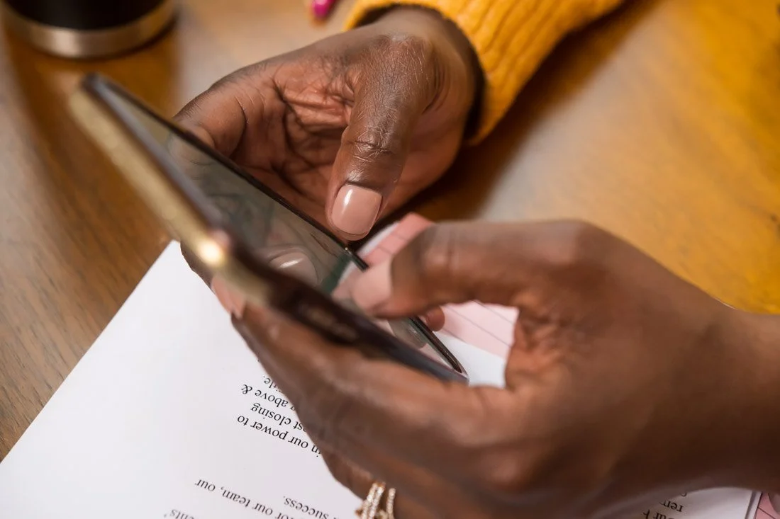 personal branding photo speaker author Jasmine Brett Stringer hands typing on phone