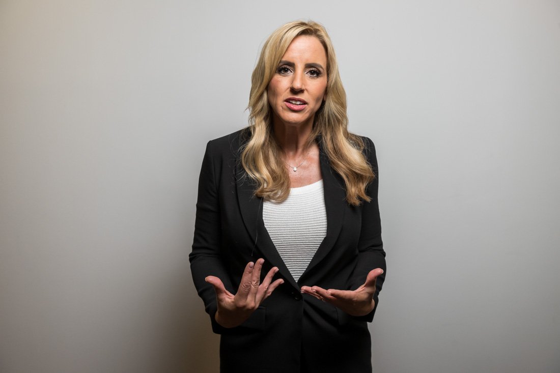 personal brand photo speaker expert Rachel DeAlto speaking to camera with emotion