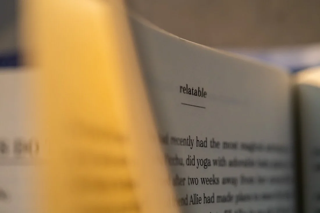 Speaker expert Rachel DeAlto book boudoir photo relatable title on top of page