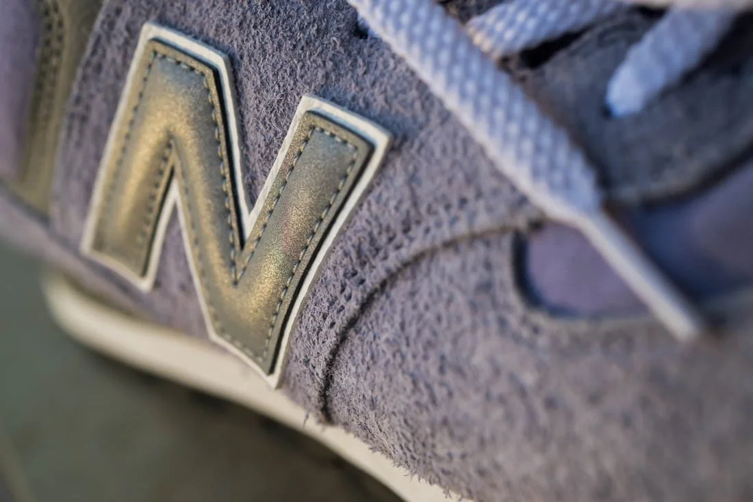 NEW BALANCE 574 2024 SNEAKER RELEASES LILAC SIDE N CLOSEUP SUNSET LIGHTING