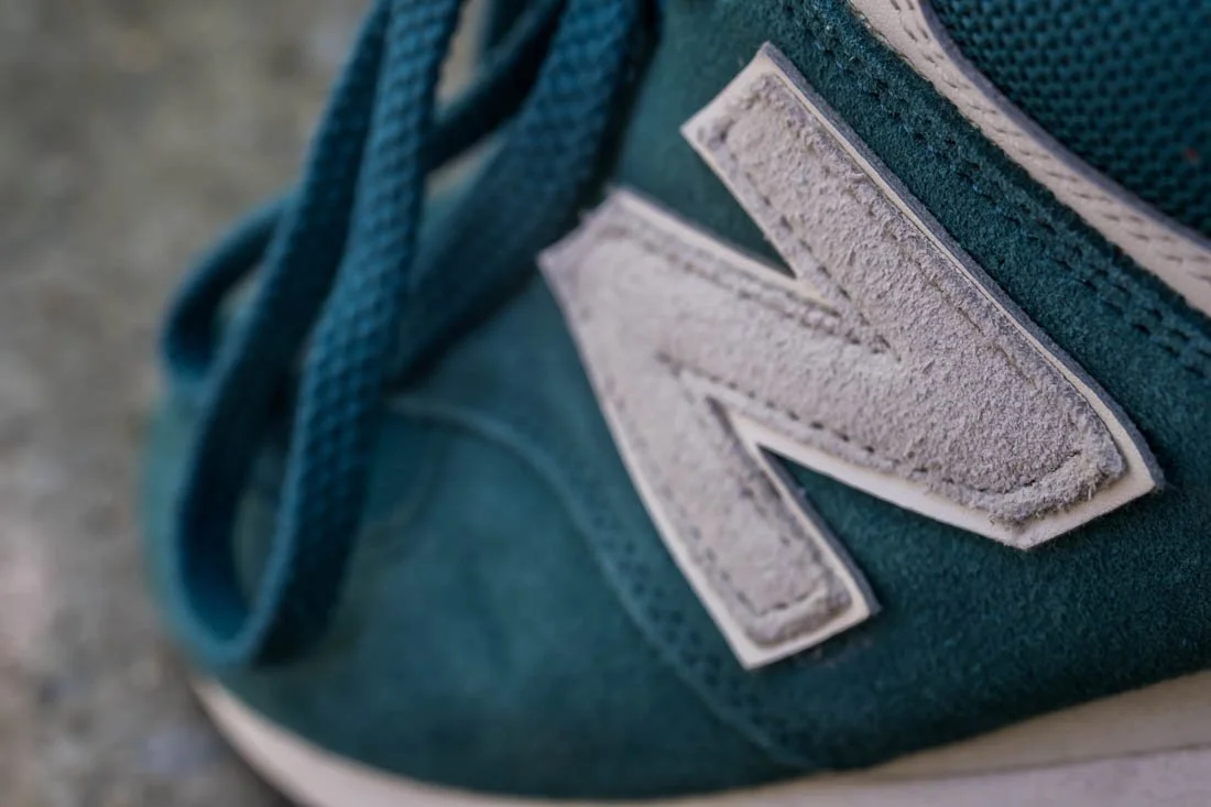 NEW BALANCE 574 COMFORT FOOTWEAR PHOTOS HIGH ANGLE SIDE N LOGO
