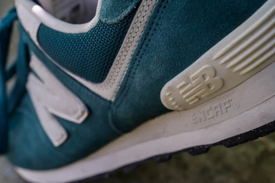 NEW BALANCE 574 COMFORT FOOTWEAR PHOTOS BOTTOM HEEL NB LOGO