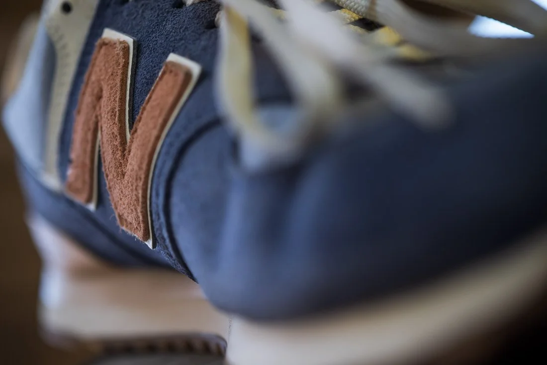 new balance 574 sneakerhead essentials peach colored N logo