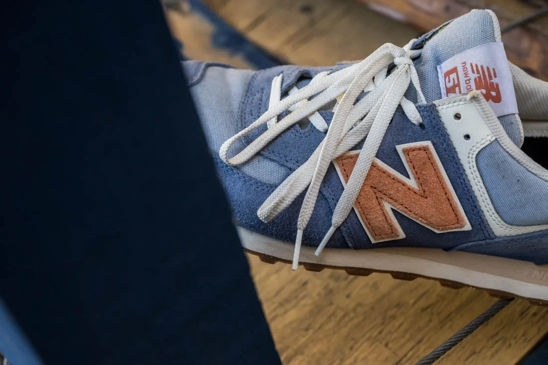 new balance 574 sneakerhead essentials high angle N logo and laces