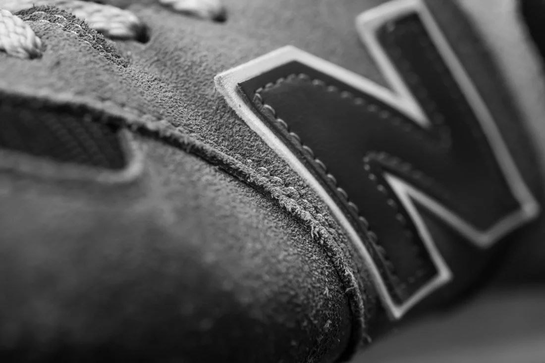 new balance 574 must owns N logo closeup from angle